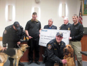 Aftermath donation to Illinois Sheriff for K-9 Grant.