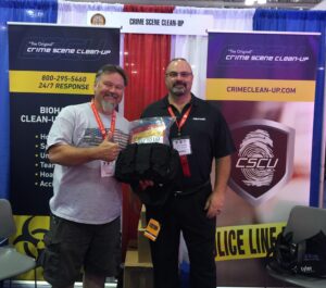 Police and Security Expo: Weston PD member poses with tactical bag.