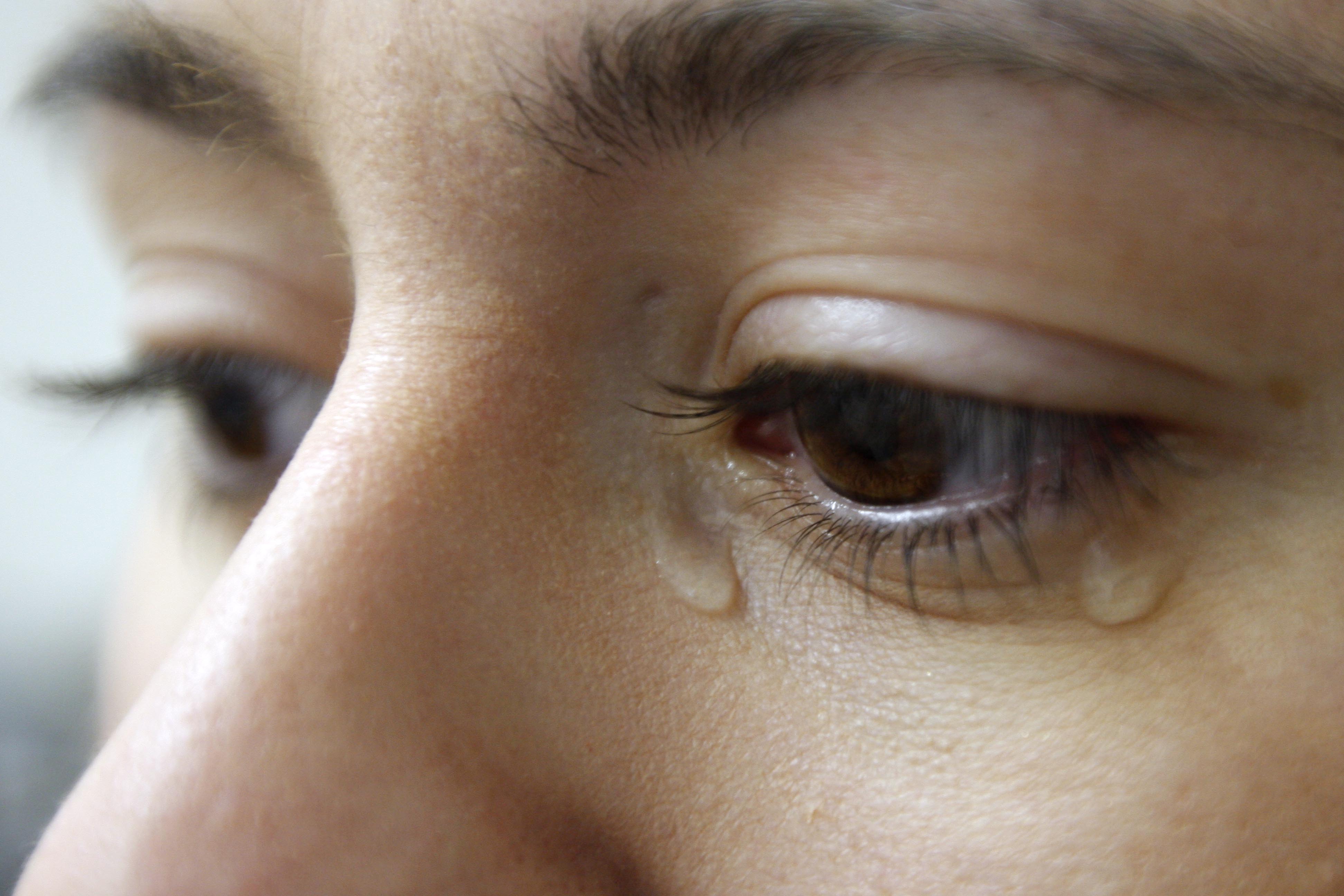 Close up of woman crying.