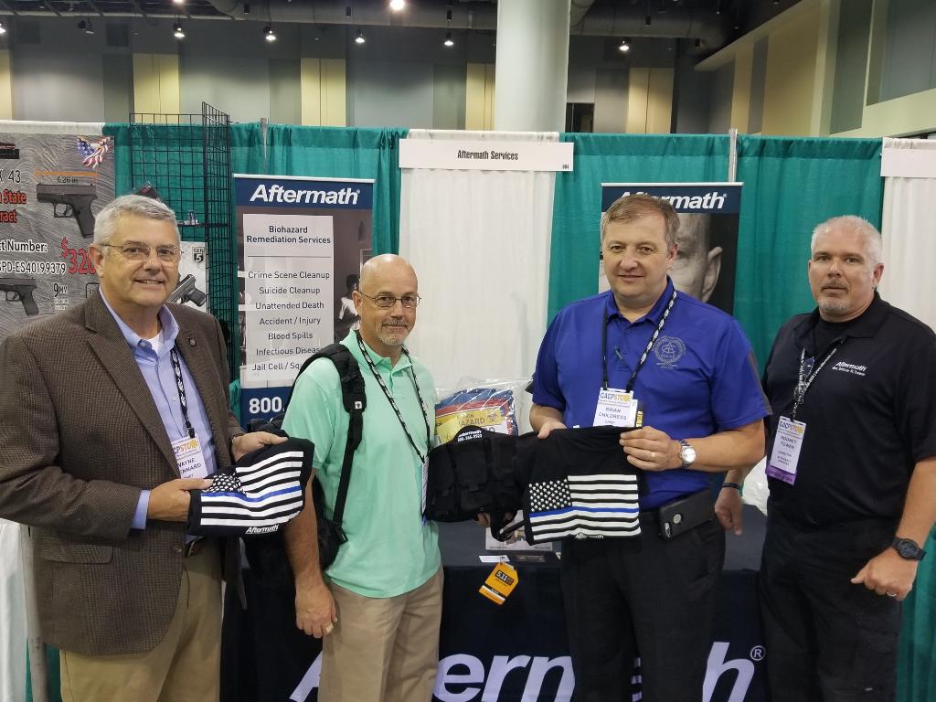 Winner of PPE kit and t-shirt at 2018 Georgia Association of Chiefs' of Police Conference.