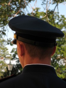 Back view of police officers head.