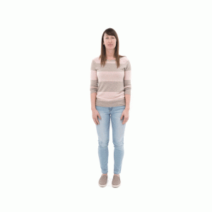 Head to toe image of woman in sweater and jeans.